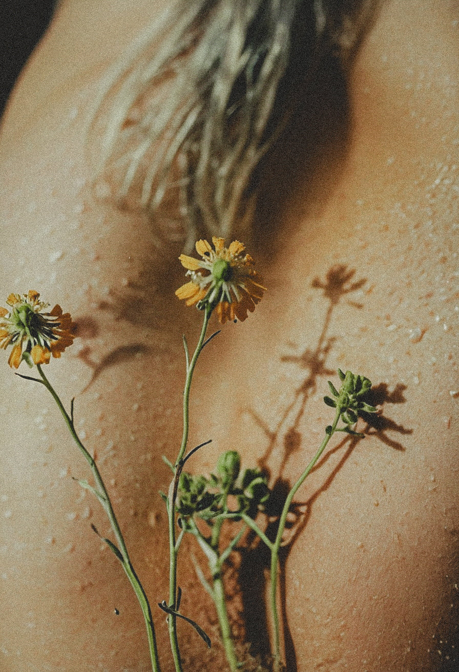 close up of moisture on a woman's back